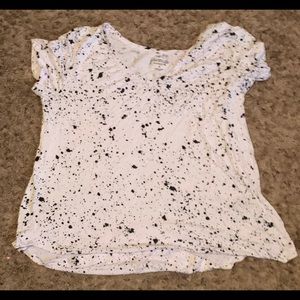 Black paint spatter white blouse